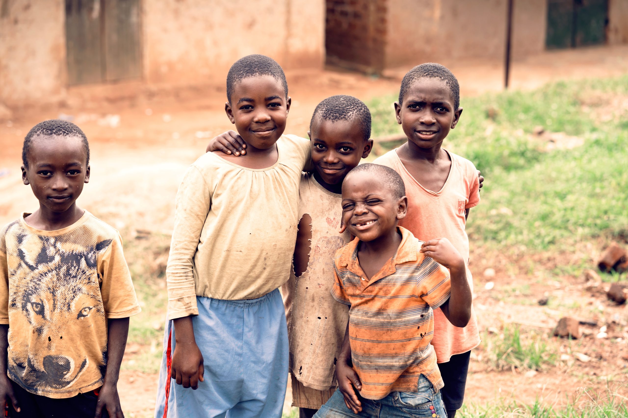 Group of Ugandan children smile at camera