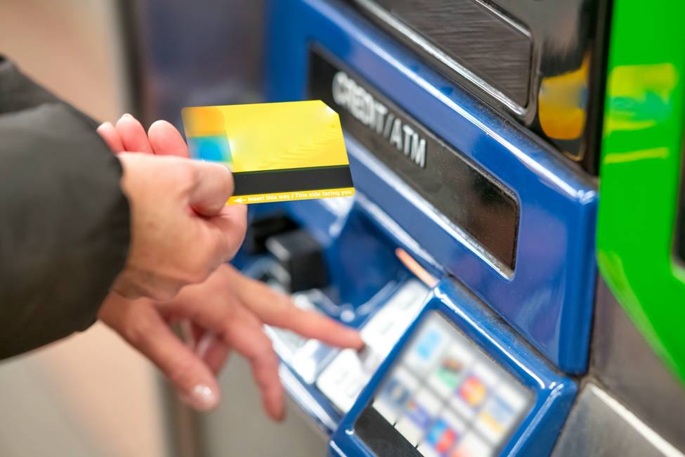 money-currency-atm-giovanni-gagliardi-unsplash-975